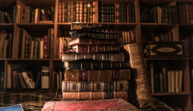 image of books stacked on a table